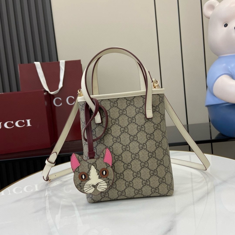 G*u*i top handle bags